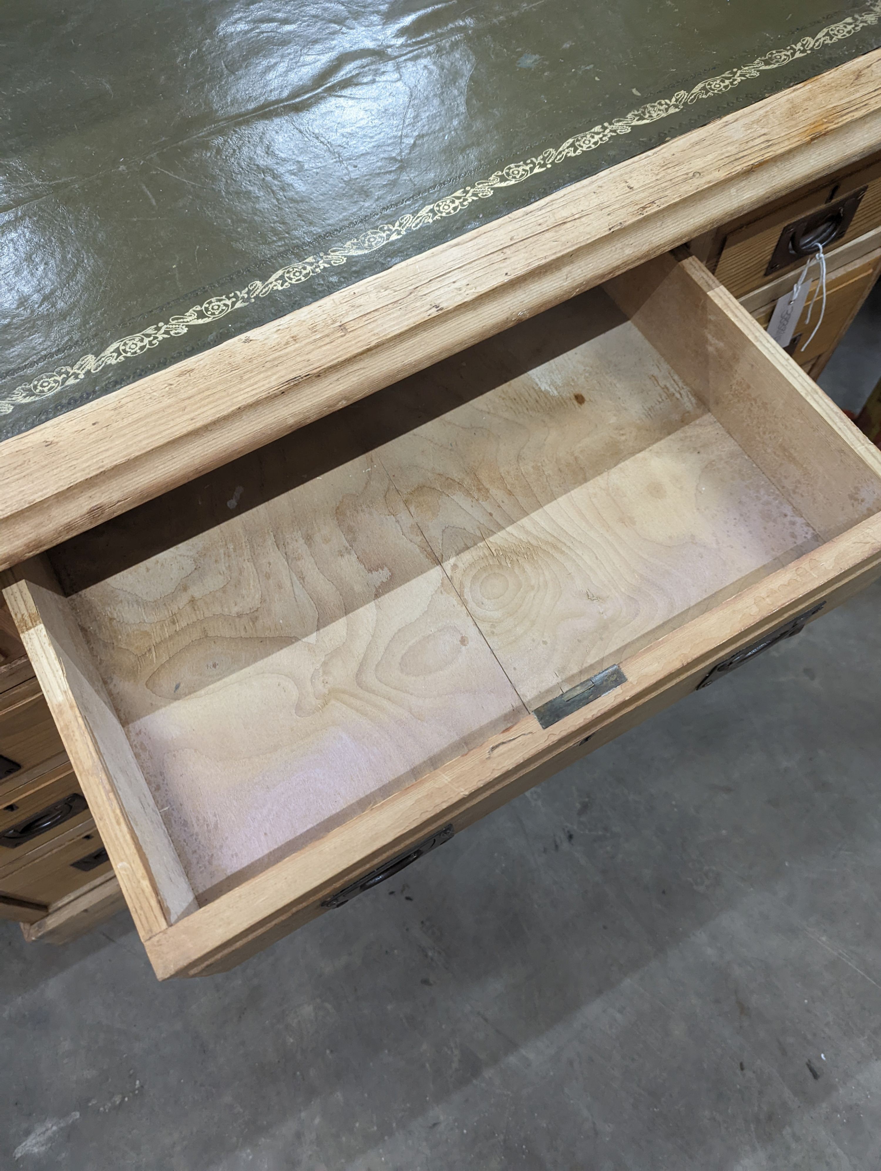 A late Victorian military style pine kneehole desk, width 102cm, depth 55cm, height 75cm